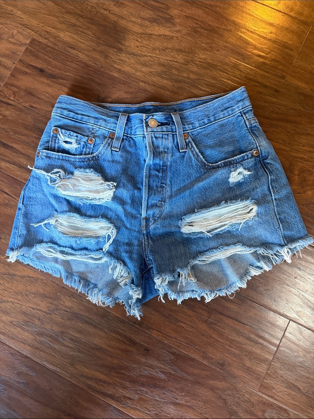 Levi's Distressed Light Blue Denim Cutoff Shorts
